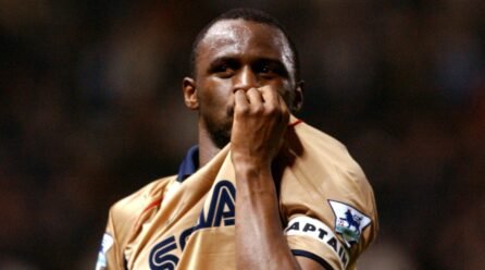 Identify the XI that gained the title at Previous Trafford, 2002