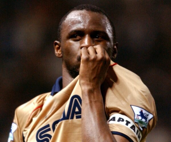 Identify the XI that gained the title at Previous Trafford, 2002